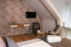 Chambre d'hôtes Ti Lann - Coin salon avec fauteuil pour prendre le thé ou le café